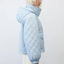 Marc O'Polo Quilted Bomber Jacket With A Fixed Hood In A Relaxed Fit Made Of Recycled Nylon Performance Fabric -Marc O'Polo Verkäufe ae04da4884182c0183ed0044750a7a24 scaled